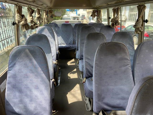 La puerta actuada manual diesel usada año usada de Mini Bus del práctico de costa de Toyota en 2011 transporta el autobús de lujo usado con 23 asientos