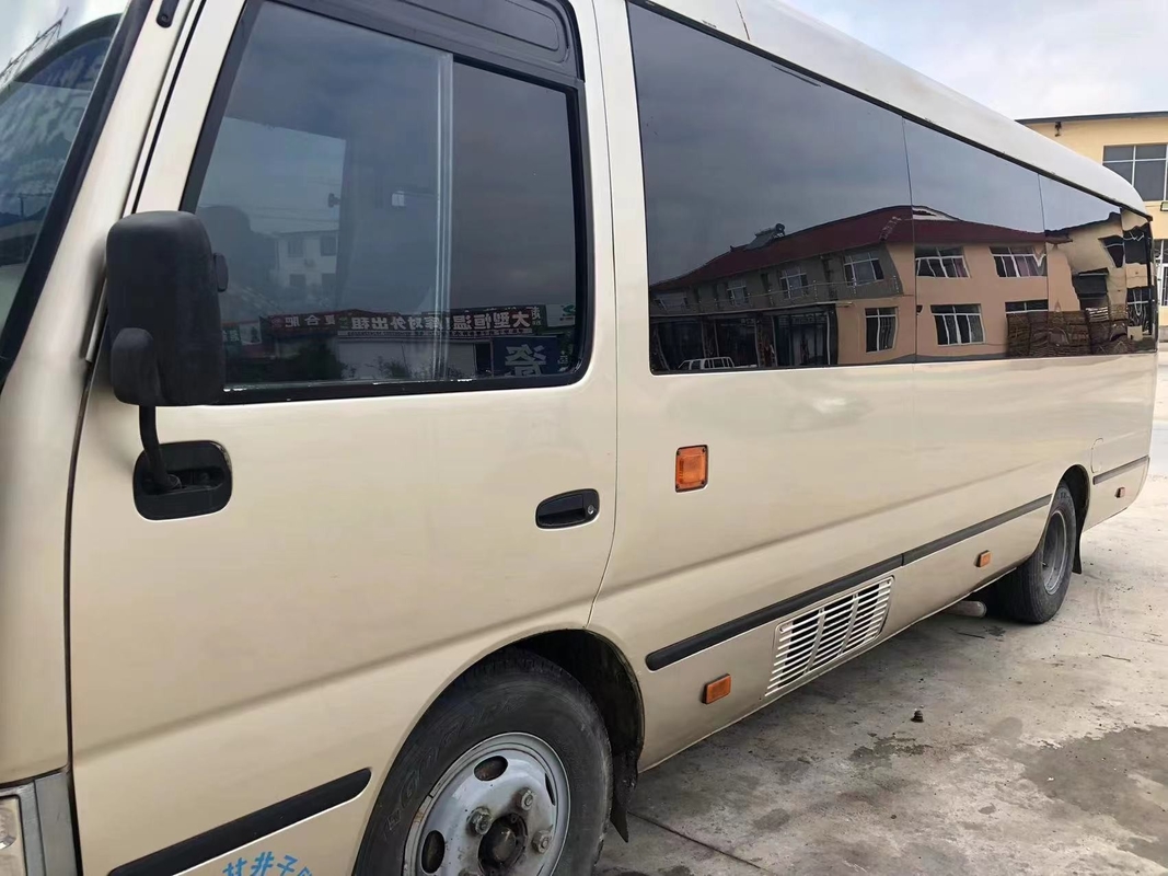 Toyota Mini Used Coaster Bus With salió puerta del pasajero de 23 asientos 1Hz motor diesel