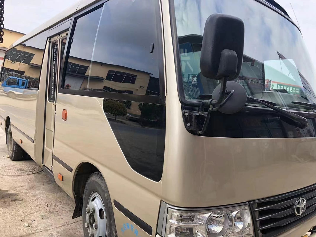 Toyota Mini Used Coaster Bus With salió puerta del pasajero de 23 asientos 1Hz motor diesel