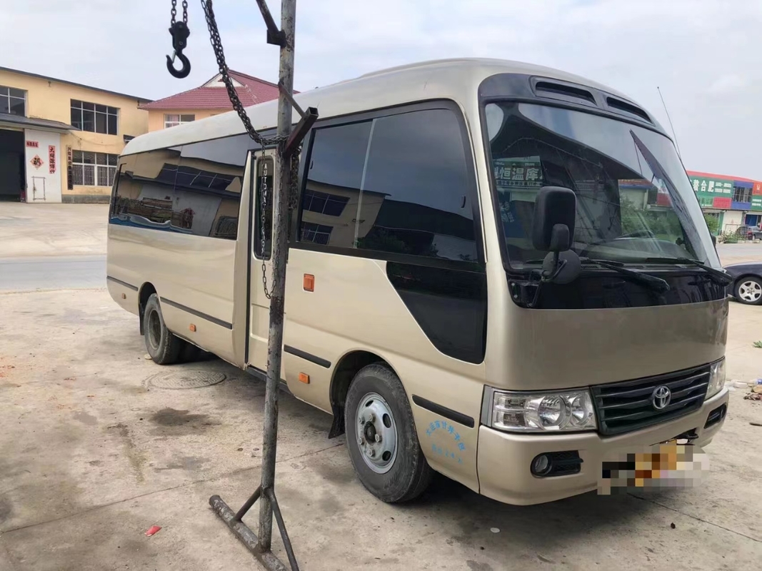 Toyota Mini Used Coaster Bus With salió puerta del pasajero de 23 asientos 1Hz motor diesel