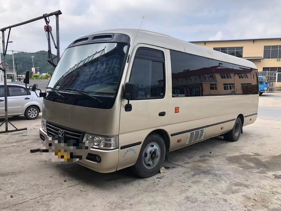 Toyota Mini Used Coaster Bus With salió puerta del pasajero de 23 asientos 1Hz motor diesel