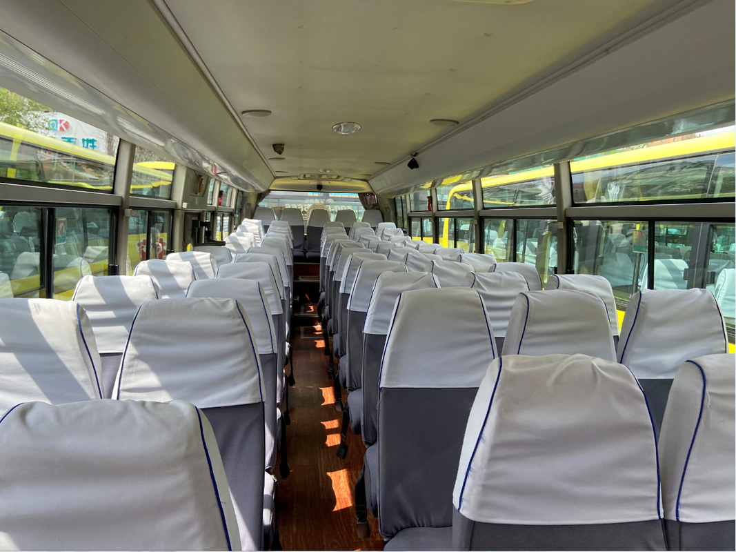 RHD/LHD Yutong usado disponible transporta 3+2 el coche diesel de los asientos YUTONG de la disposición de Seat 60