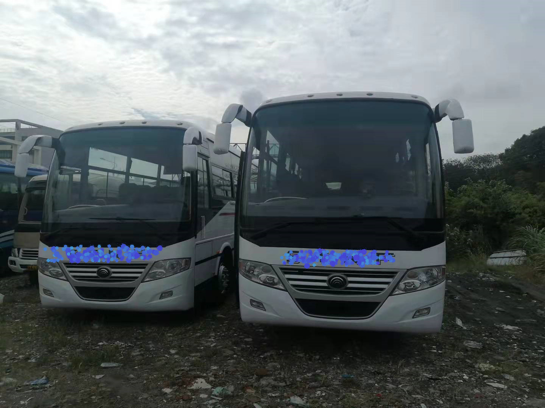 RHD/LHD utilizó al coche Bus 2+3layout 60seats con la suspensión de parachoques Yutong ZK6112D de la primavera de placa