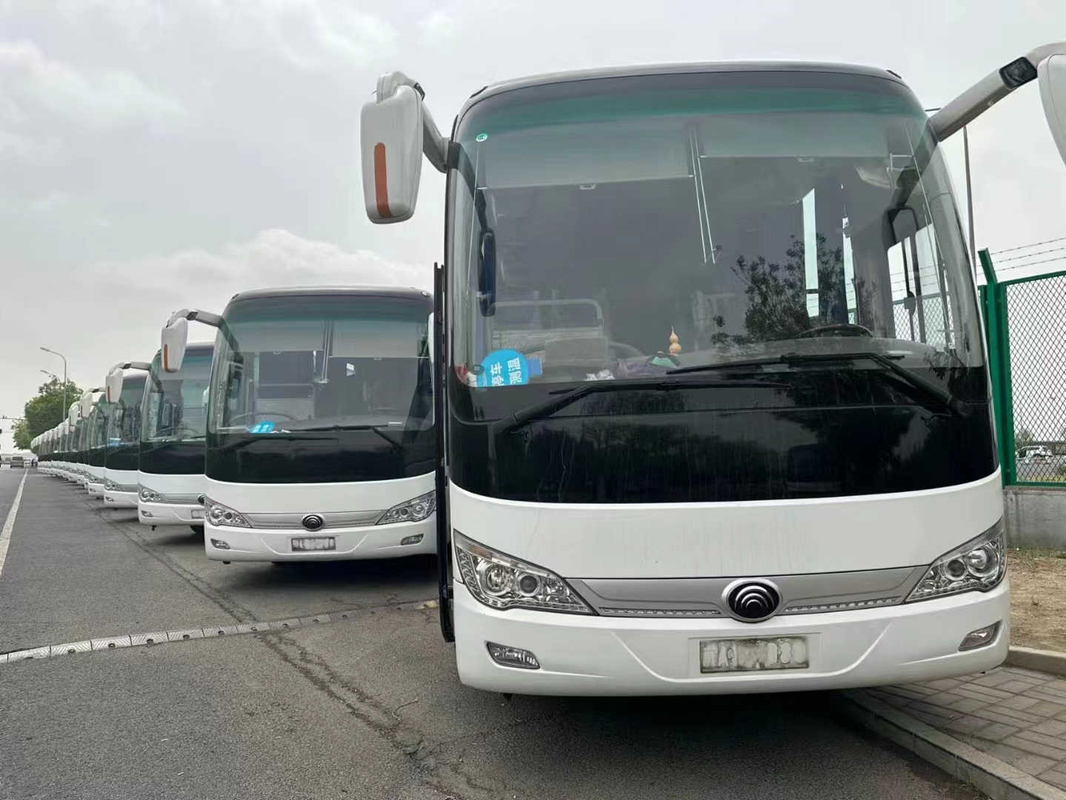 Los asientos blancos usados del color 50 del autobús de lujo plano resorte autobús ZK6119 de Yutong de la mano del motor raro medio de la puerta de 2018 años el 2do