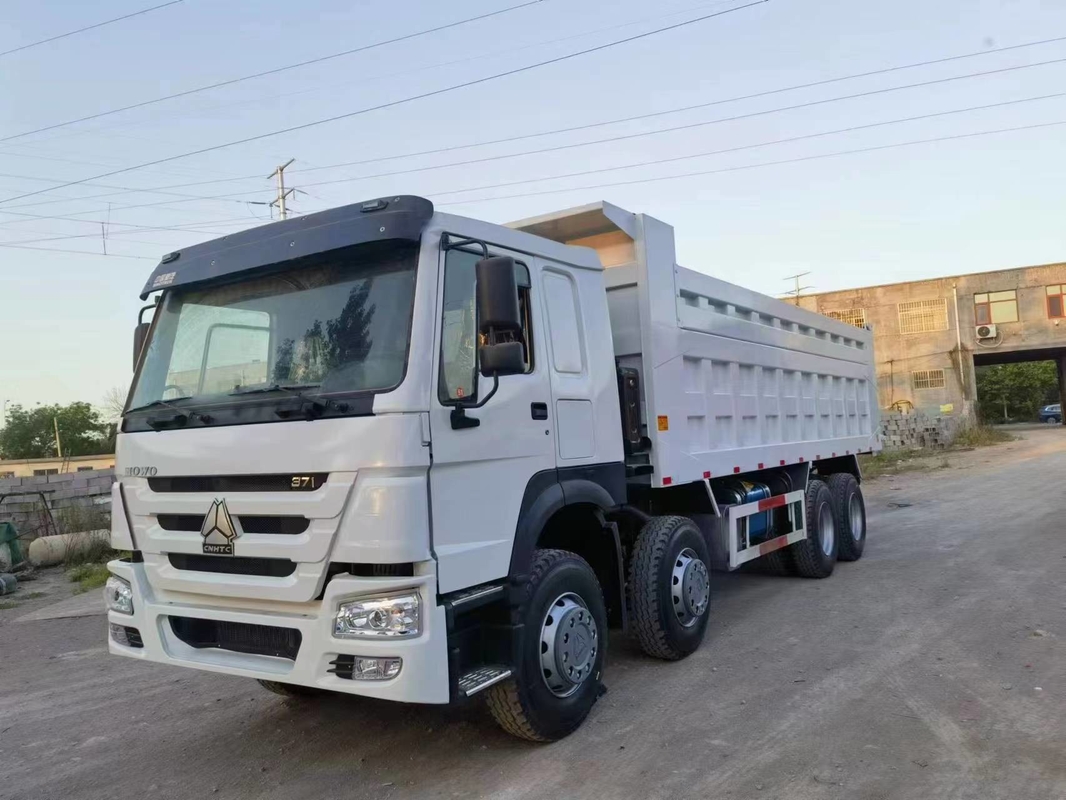 El combustible usado acarrea el modo blanco de la impulsión de la impulsión 8×4 de la mano izquierda del color camión volquete usado los caballos de fuerza de 371 HOWO