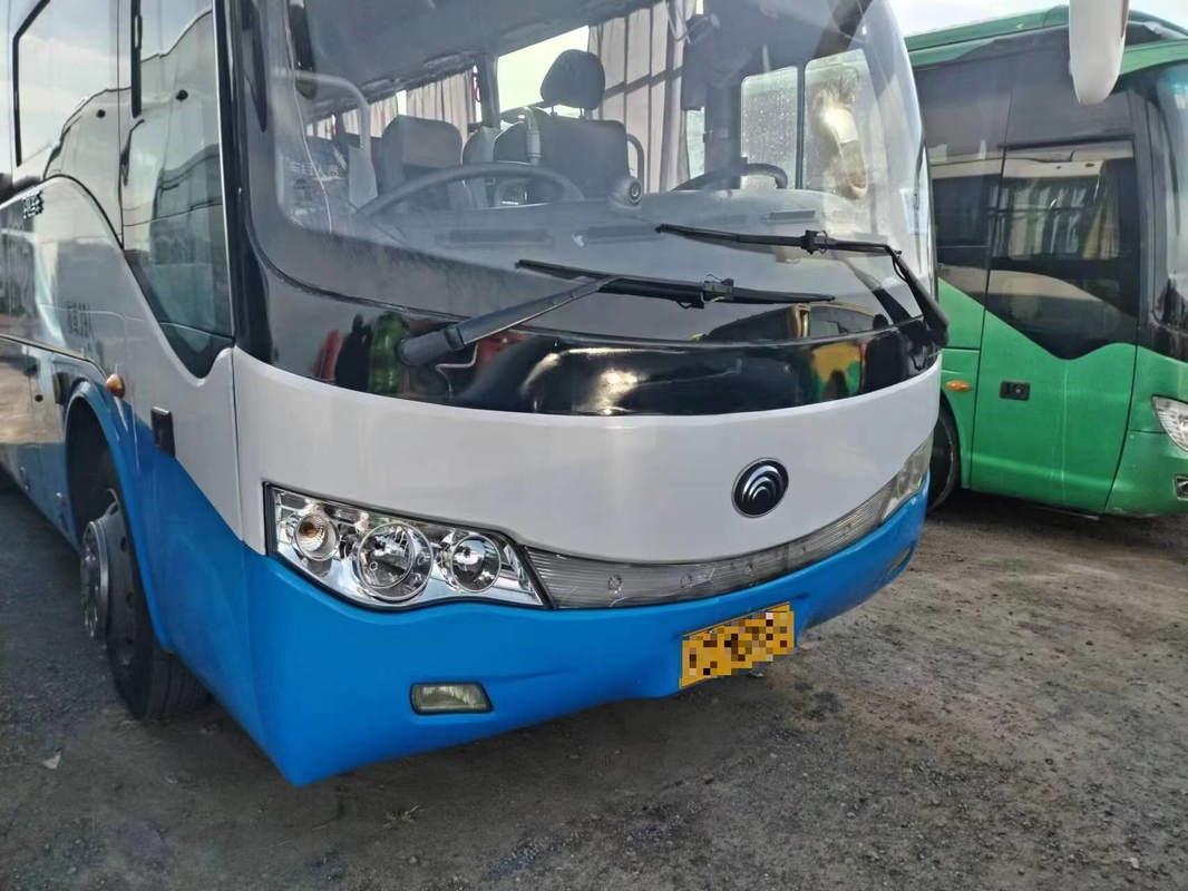 Youngtong 39 asientos Autobús de transporte usado ZK6879 de primavera de hoja de puerta única buena climatización