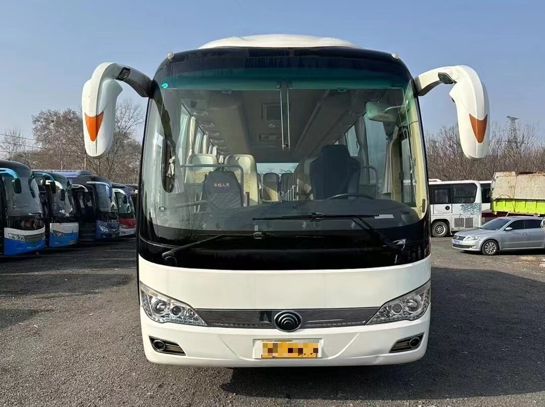 Pasajero Usado y Viajando 2015 Año 39 asientos YUTONG Bus ZK6876 Uso de Primavera de Hojas en el mal camino