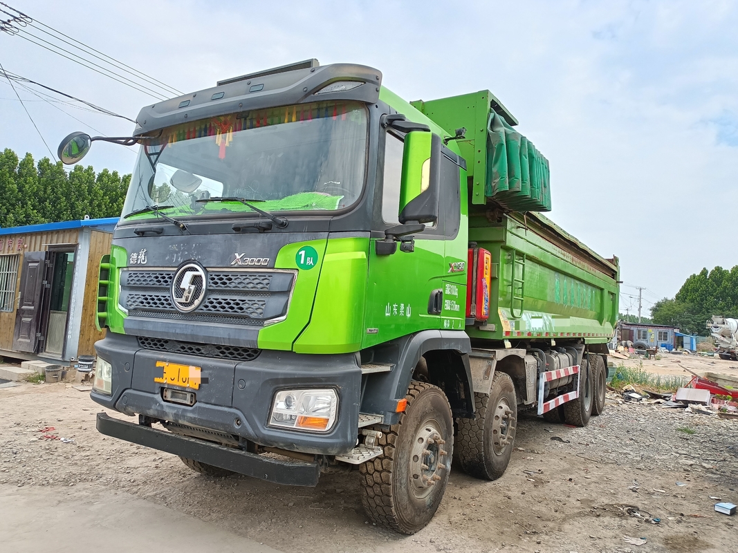 8x4 camión con tirador Shacman camión de basura en venta 2021 año 30-50 toneladas de rocas Transporte de arenas
