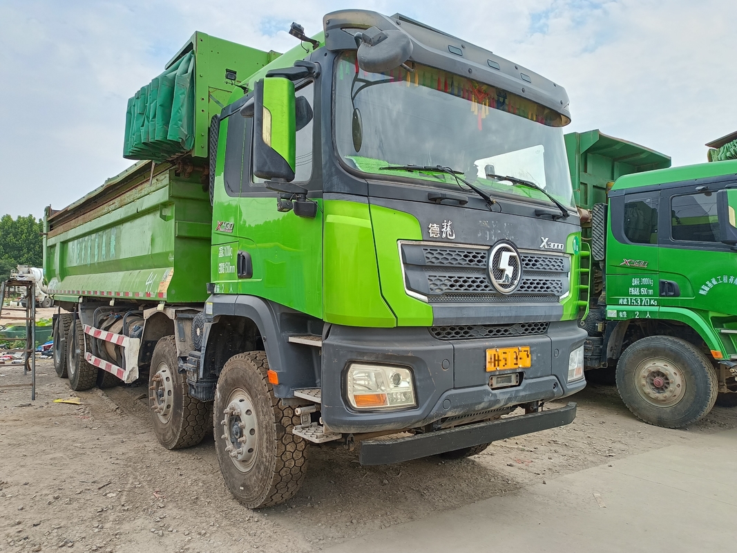 8x4 camión con tirador Shacman camión de basura en venta 2021 año 30-50 toneladas de rocas Transporte de arenas