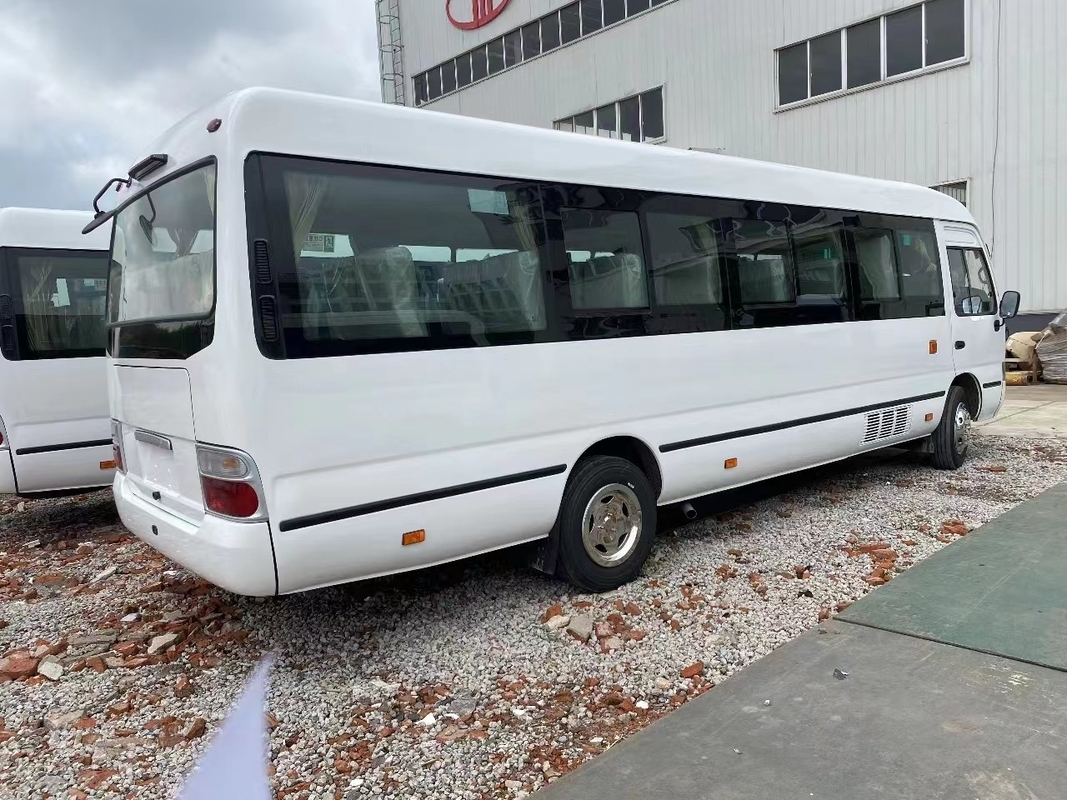 Autobús de montaña Usado Mudan Minibus 30 asientos Dirección a mano derecha Uso en Tanzania Primavera de hojas para la mala carretera