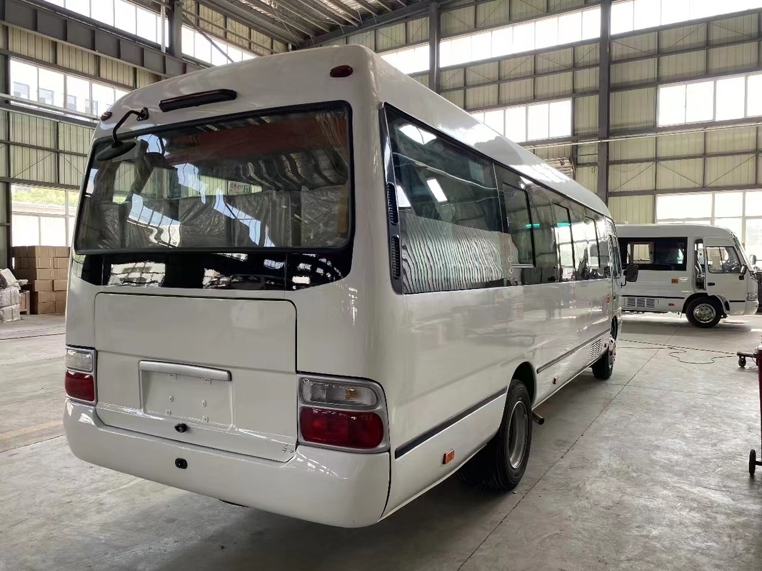 Autobús de montaña Usado Mudan Minibus 30 asientos Dirección a mano derecha Uso en Tanzania Primavera de hojas para la mala carretera