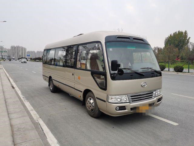 2015 el autobús más alto usado del práctico de costa del año 10 asientos, utilizó a Mini Bus Coaster Bus 86kw con los asientos de lujo para el negocio