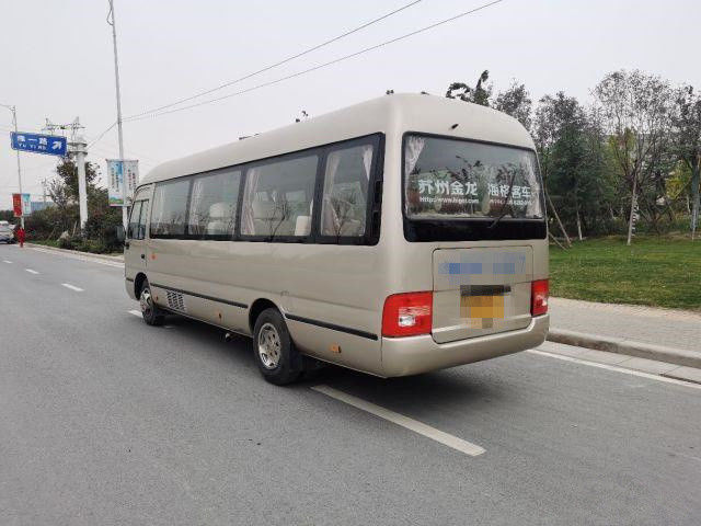 2015 el autobús más alto usado del práctico de costa del año 10 asientos, utilizó a Mini Bus Coaster Bus 86kw con los asientos de lujo para el negocio
