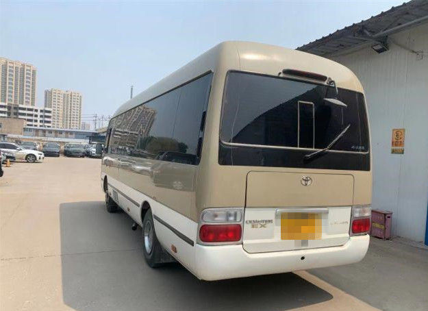 El autobús usado 20 asientos del práctico de costa utilizó a Mini Bus Toyota Coaster Bus con el motor de gasolina 2TR dirección de la mano izquierda de 2007 años