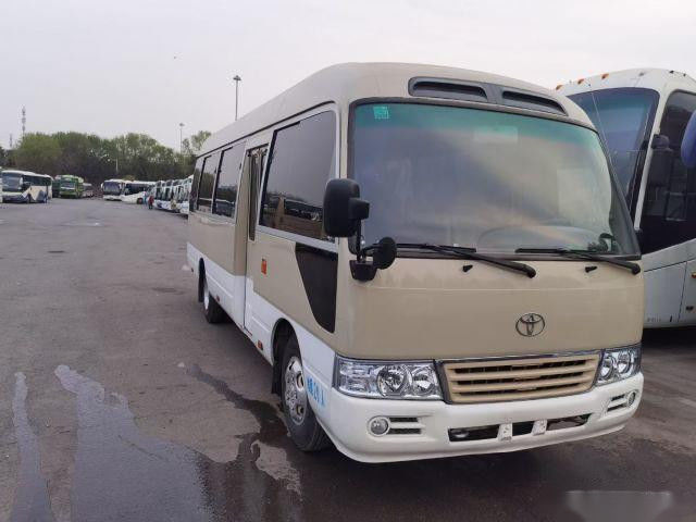 Kilómetro bajo usado impulsión usado del autobús del pasajero de la mano izquierda de la gasolina de los asientos del práctico de costa 20 del autobús de Toyota