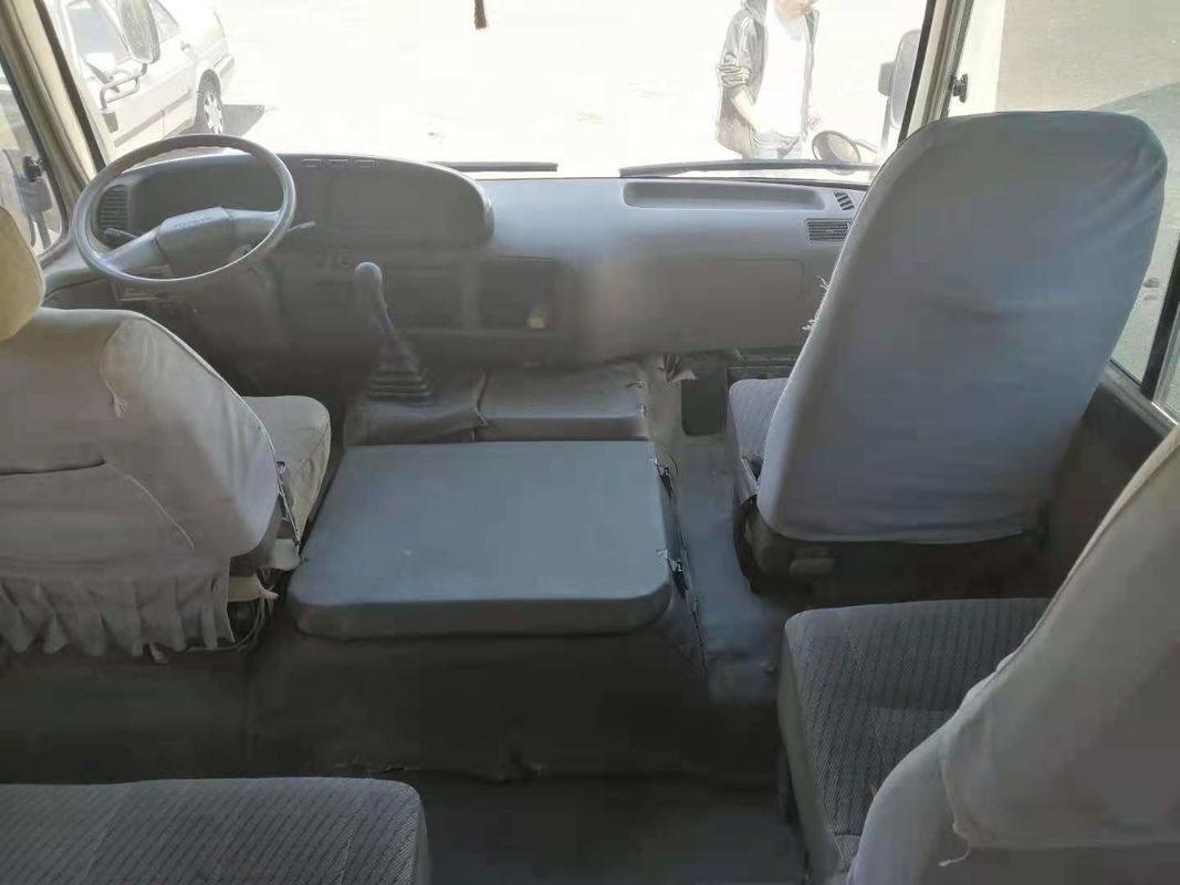 Práctico de costa japonés usado autobús usado kilómetro bajo de la marca del autobús del práctico de costa del pasajero de la impulsión de la mano izquierda del motor diesel 1HZ 23-29seats