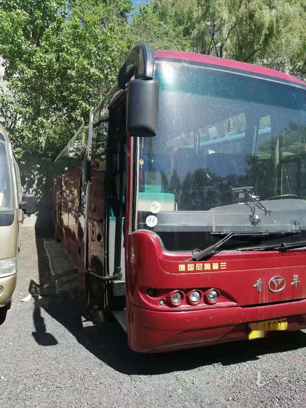 Las puertas dobles usadas del saco hinchable del chasis 48seats del autobús NEOPLAN de Youngman salieron del autobús usado motor posterior de dirección del pasajero