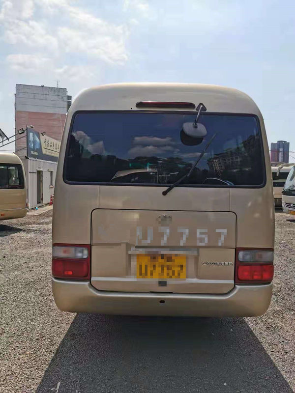 El autobús usado 23 asientos del práctico de costa utilizó a Mini Bus Toyota Coaster Bus con el motor de gasolina 3RZ dirección de la mano izquierda de 2012 años