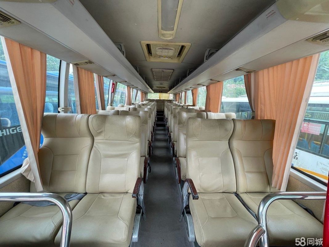 Dragon Used Coach Bus de oro 47 puertas del euro III de acero del chasis del motor de Hino J08E de los asientos solas