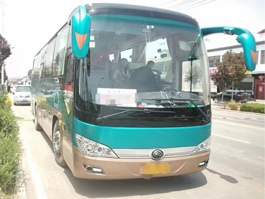 Los autocares usados ponen verde autobús ZK6906 de Yutong de la mano del pasajero de los asientos del color 36 el 2do del aire acondicionado medio de la puerta