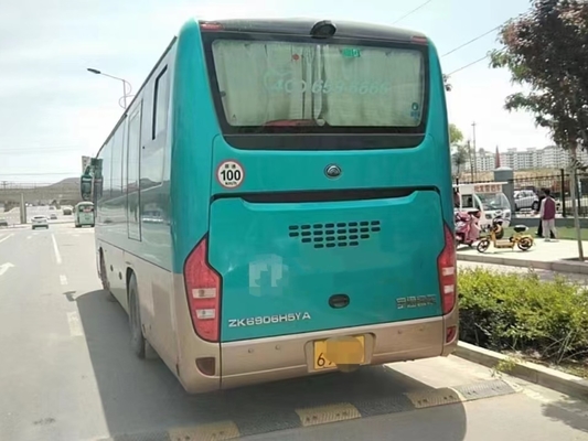 Los autocares usados ponen verde autobús ZK6906 de Yutong de la mano del pasajero de los asientos del color 36 el 2do del aire acondicionado medio de la puerta